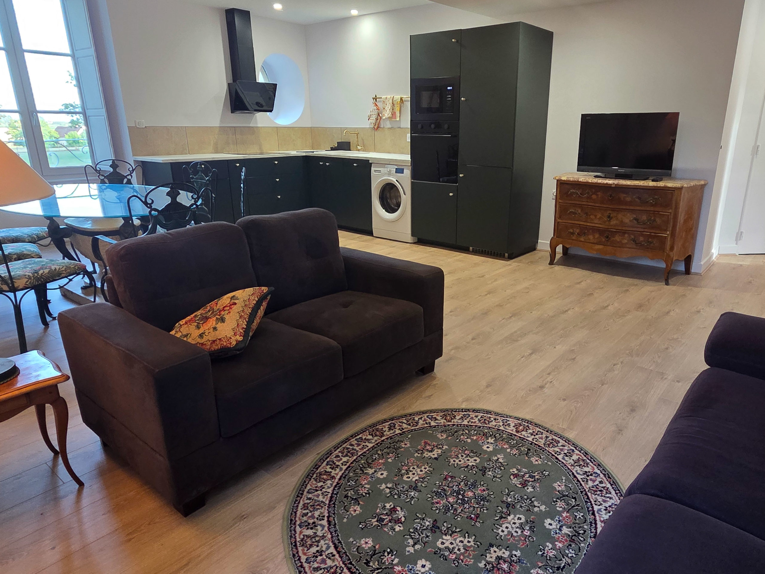 Salon et cuisine du gîte La Sans Pareille